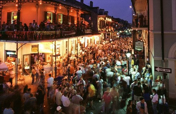 Crowd of people in downtown bar district - nightlife public safety